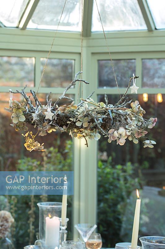 Suspended Christmas garland made from natural materials 