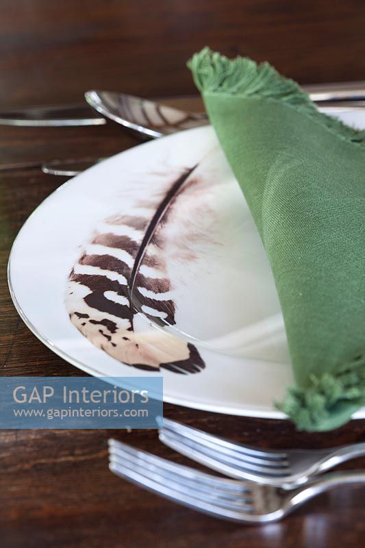 Feather plate on dining table 