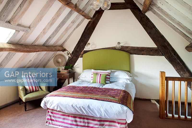 Bedroom with vaulted ceiling 