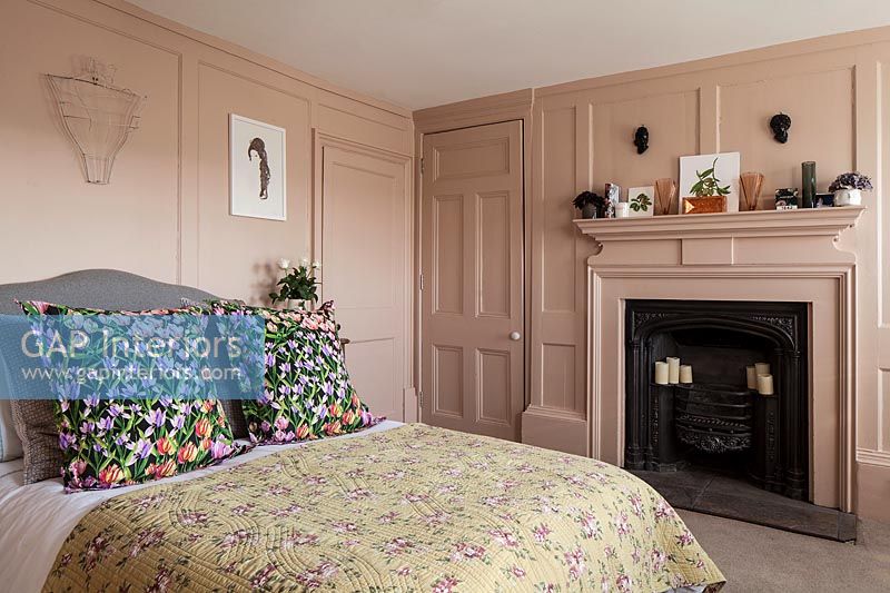 Dusky pink painted country bedroom 