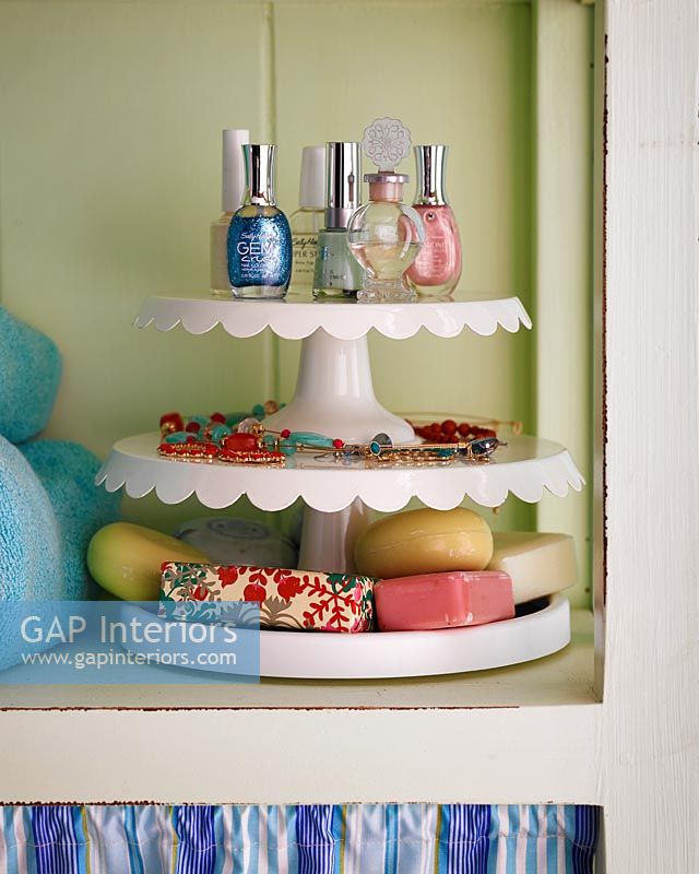Cake stand used to store bathroom accessories 