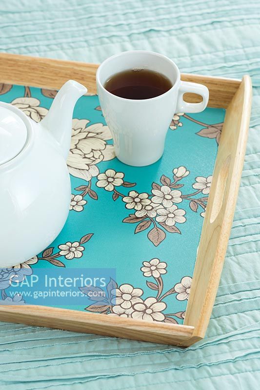 Tea tray lined with floral wallpaper 