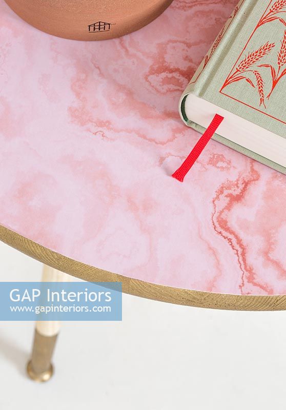 Pink side table - created by covering with wallpaper 