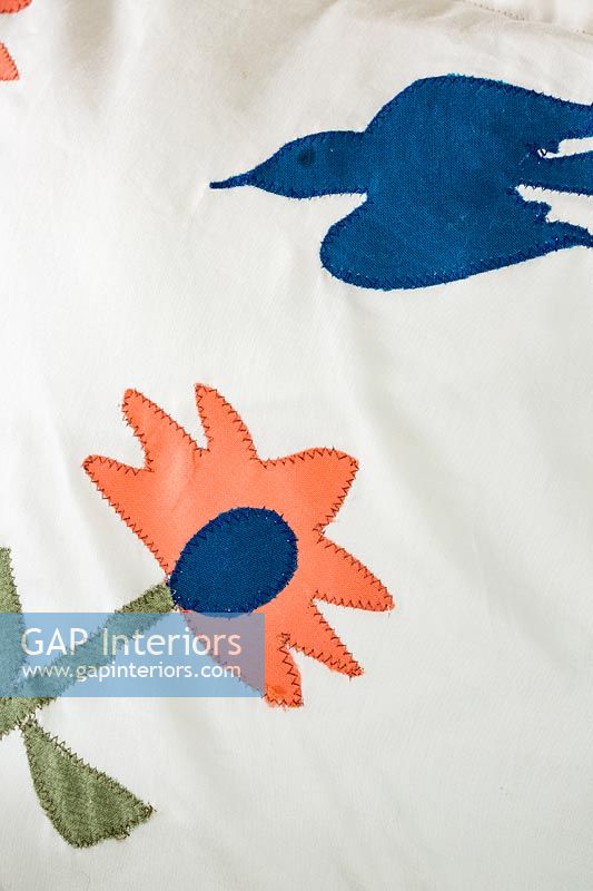Embroidered cushion - bird and flower, folk art motif 