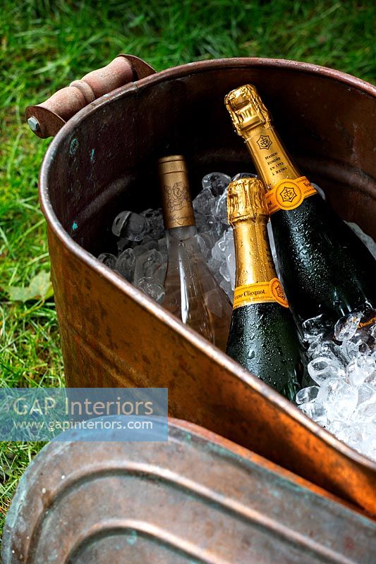 Champagne bottles in a bucket of ice