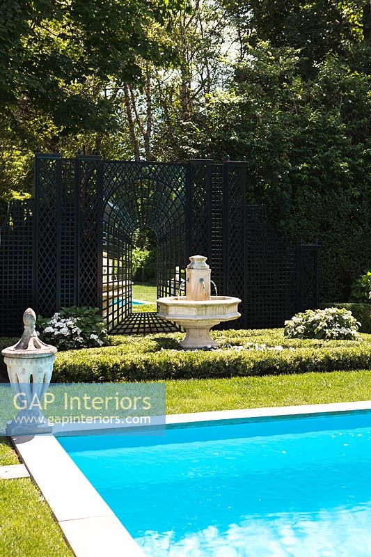 Luxury swimming pool in formal gardens 