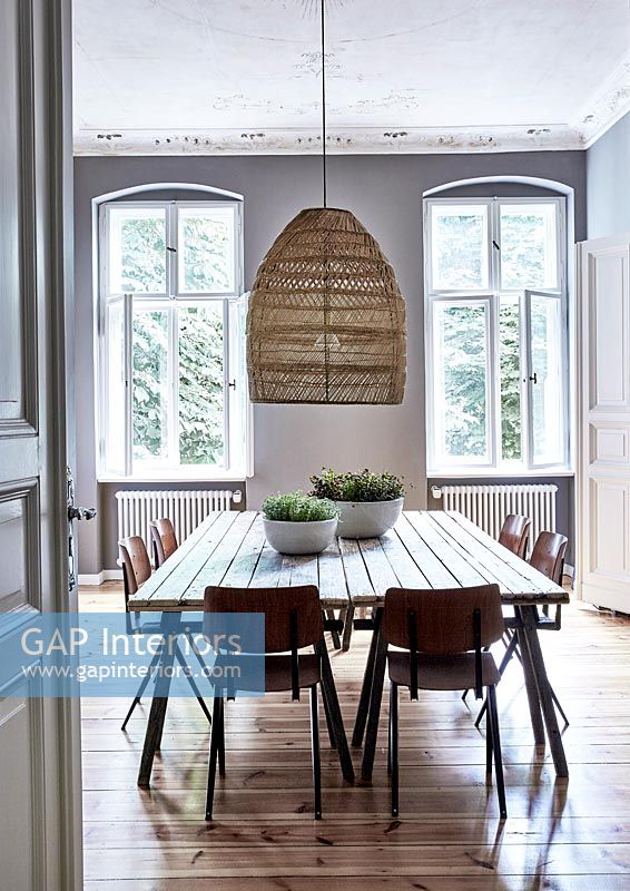 Wooden dining table in modern dining room 