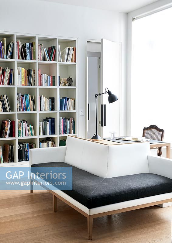 Alcove shelves in modern reading room 