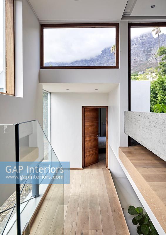 Contemporary hallway with view of mountains