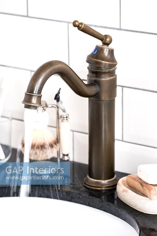 Mixer tap in modern bathroom  