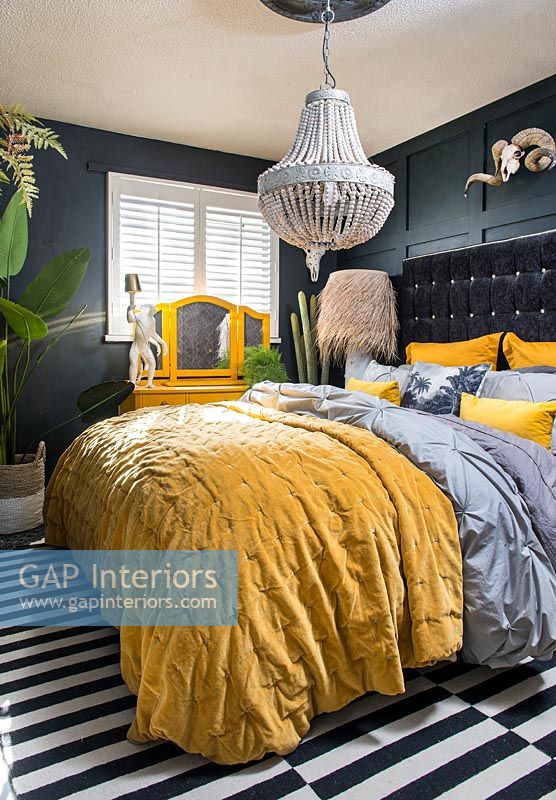 Eclectic black and yellow bedroom 