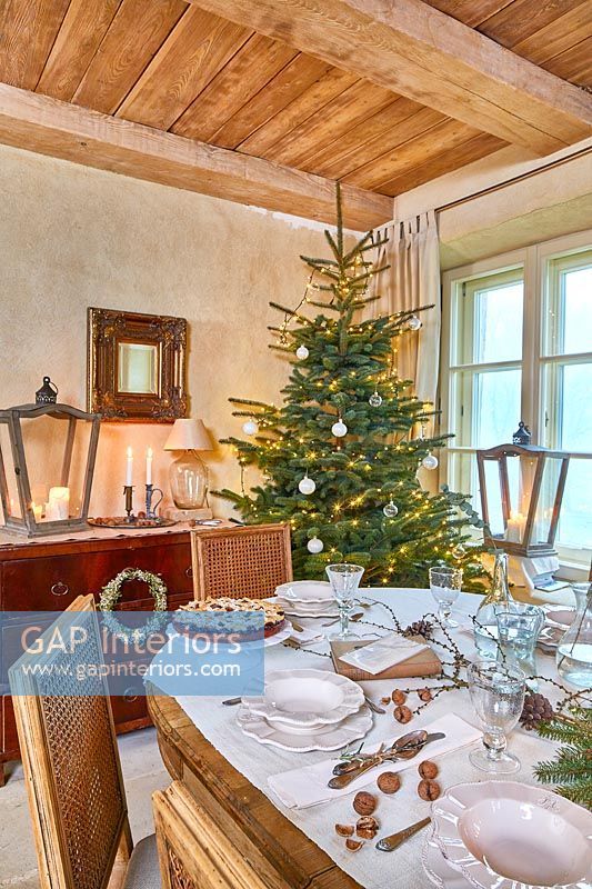 Country dining room set for Christmas dinner 