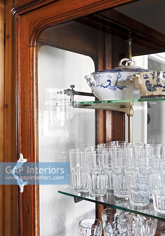 Glassware displayed in cabinet 