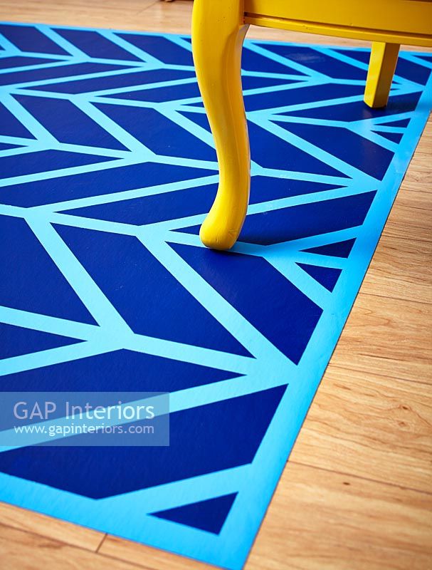 Colourful blue patterned rug 