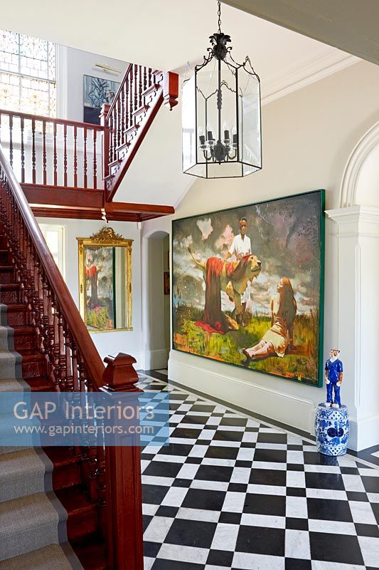 Large hallway with checkerboard floor 