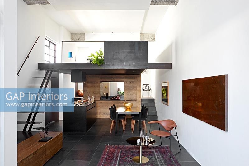 Modern dining room with kitchen