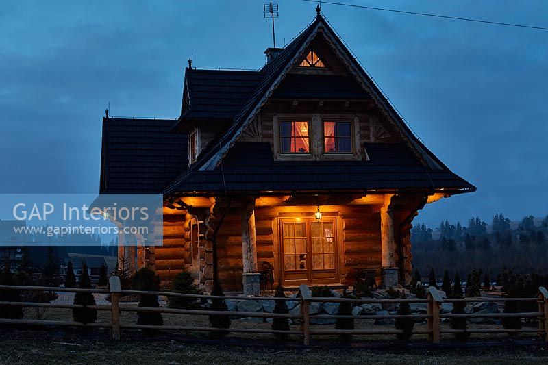 Wooden house at night 