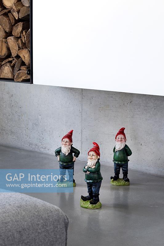 Dwarf figurines on concrete floor