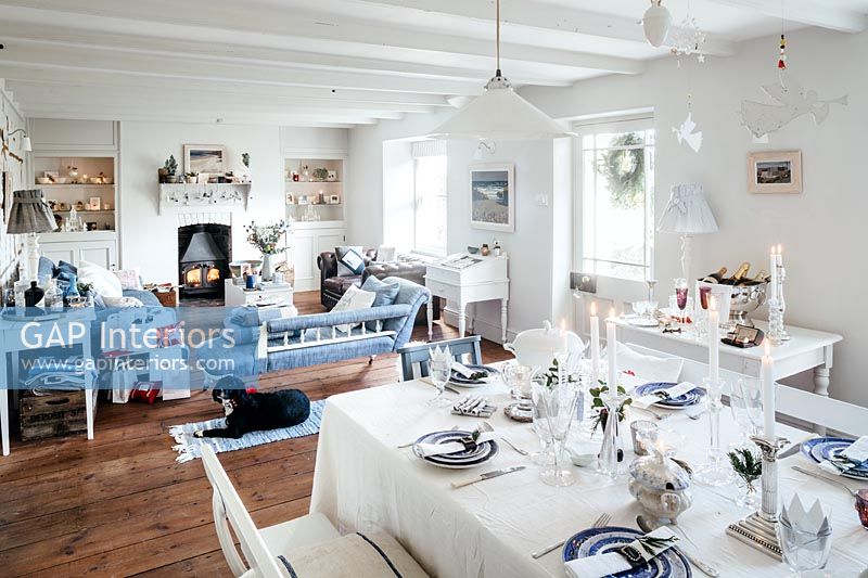 Country living and dining room decorated for Christmas 
