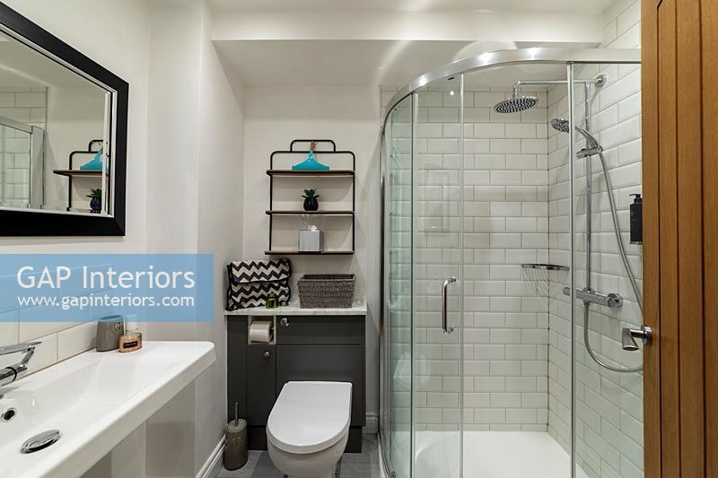 Modern bathroom with curved shower enclosure