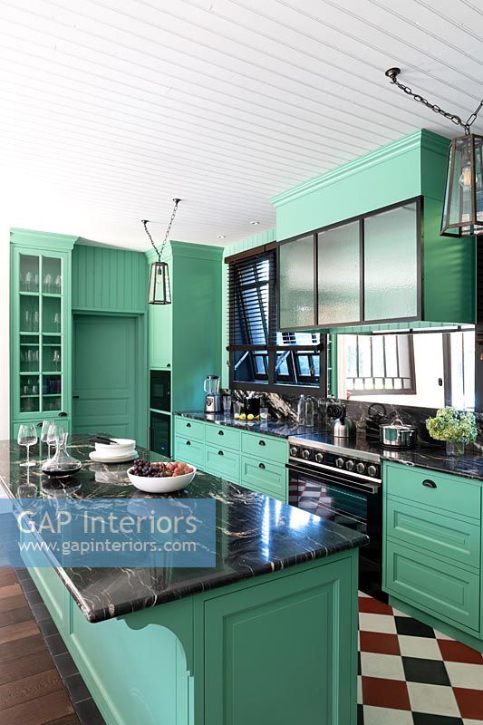 Green and black kitchen 