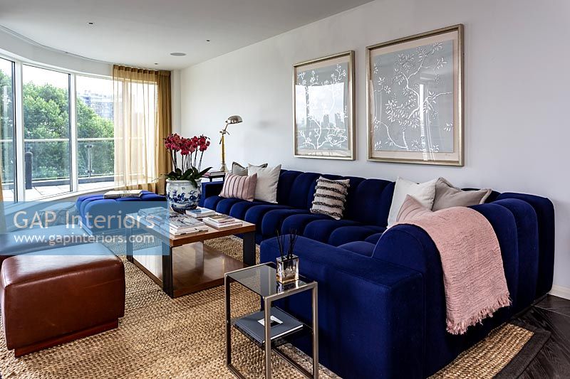 Blue corner sofa in modern living room 