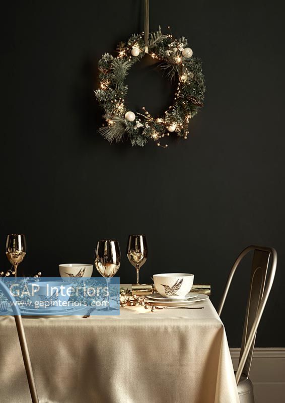 Black and gold dining room at Christmas 