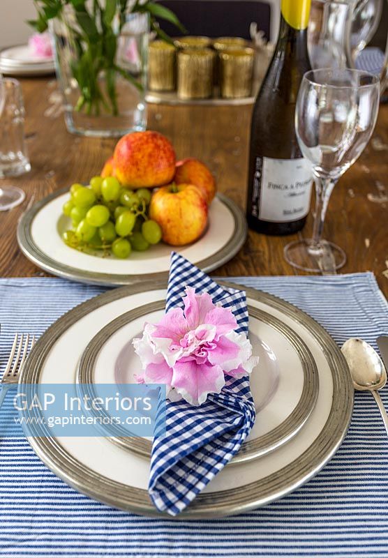 Floral napkin ring on dining table 