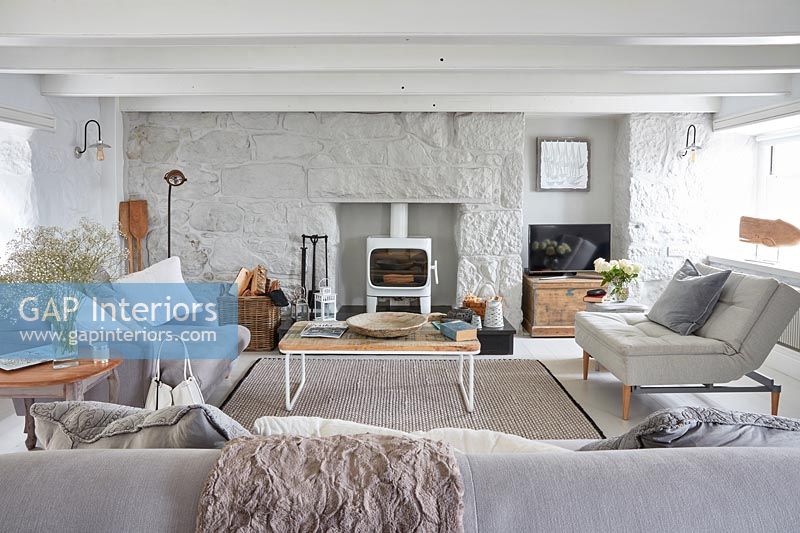Modern country living room in grey and white muted tones 
