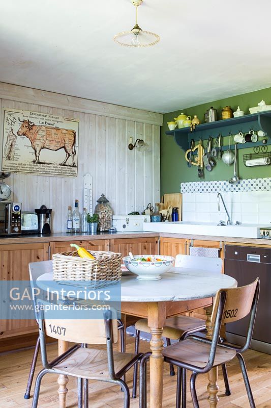 Country kitchen diner with vintage furniture 