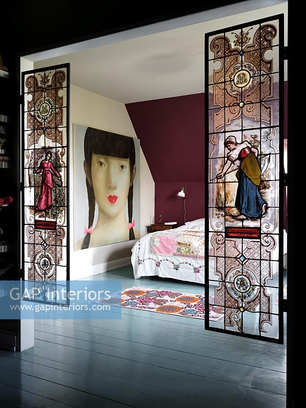 Stained glass screens in bedroom doorway 