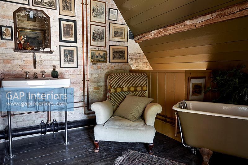 Armchair in country bathroom 