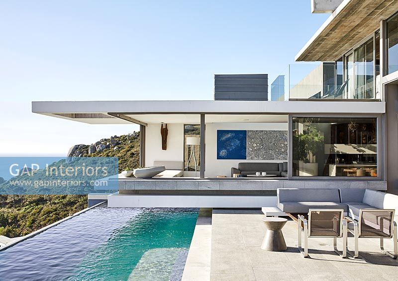 Modern patio with infinity swimming pool