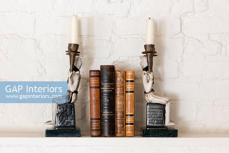 Classic candle sticks with books 