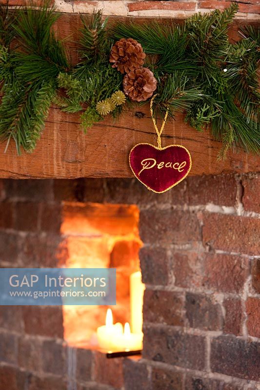 Traditional fireplace decorated for Christmas 