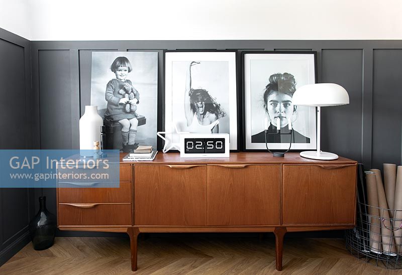 Retro sideboard with portraits 