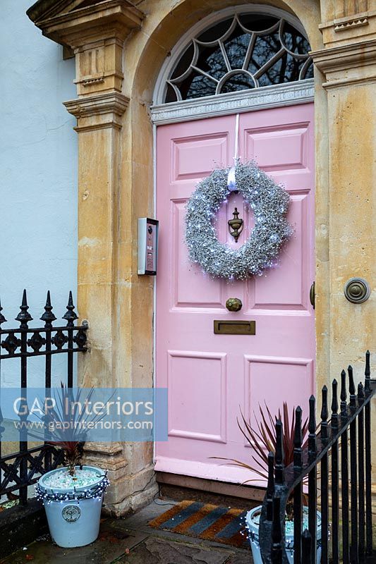 Classic house front door with Christmas wreath 