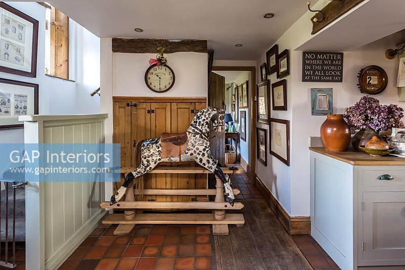 Country rocking horse in hallway 