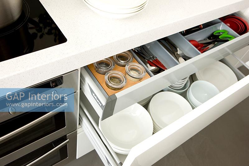 Open drawers in contemporary kitchen