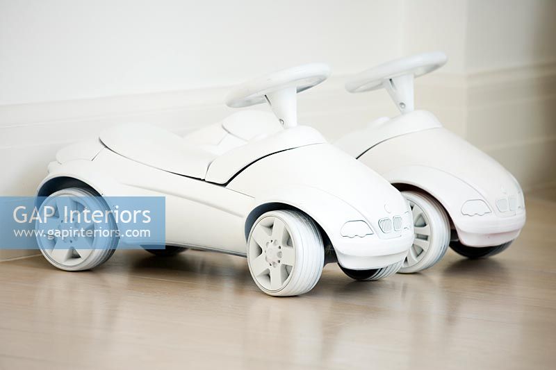 Modern white toy cars 