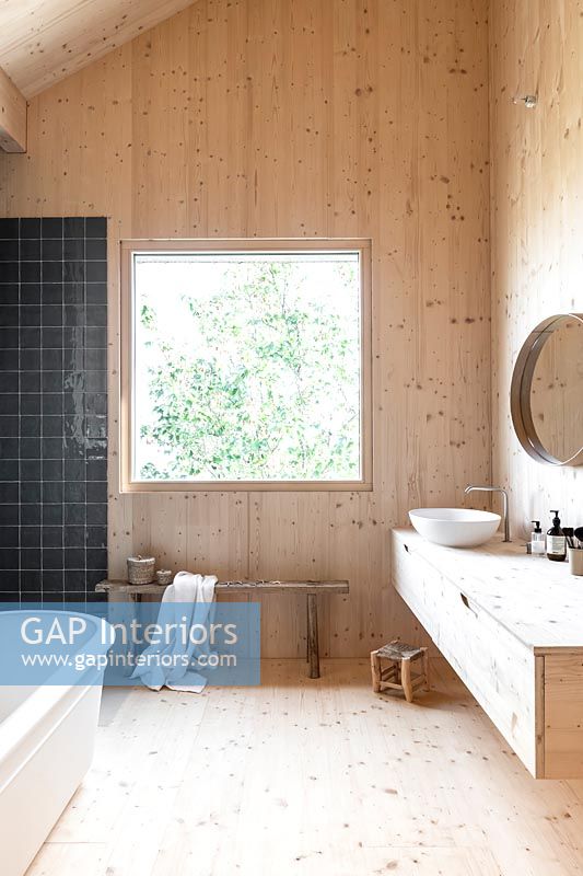 Modern timber clad country bathroom 