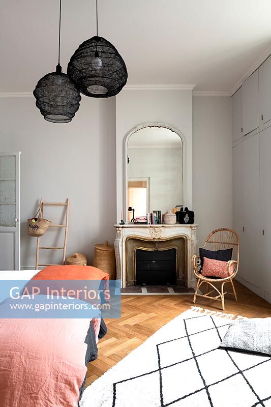 Modern children's room with fireplace and period details 