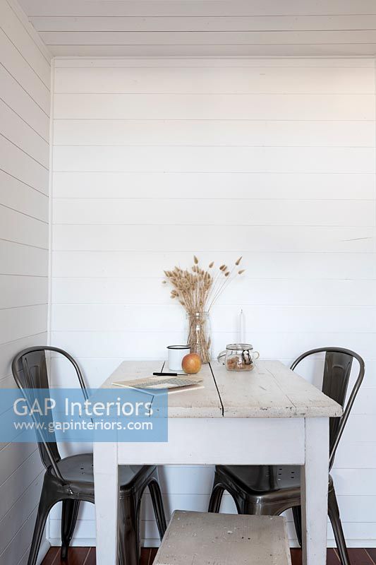 Small monochrome modern country dining room 