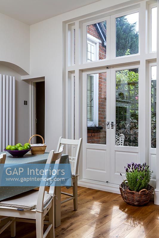 French windows leading to garden from dining room 