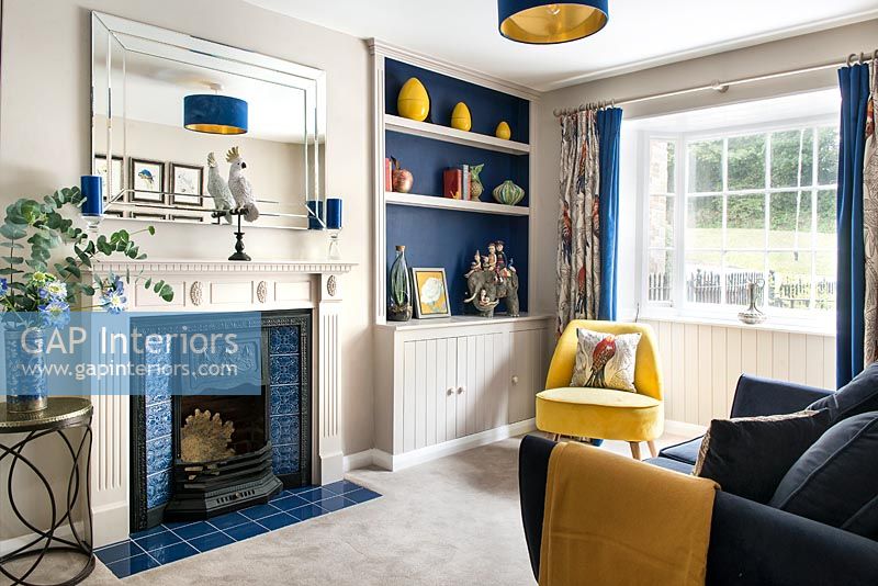 Modern blue and yellow themed living room 