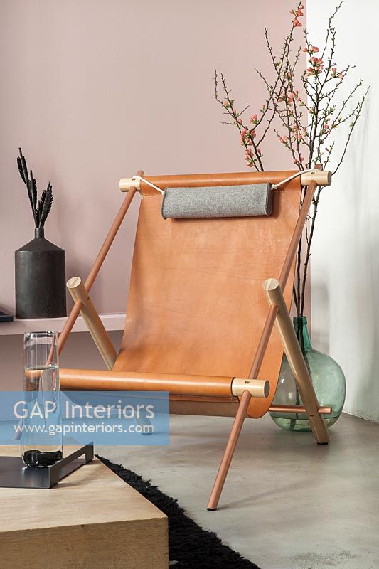 Leather deckchairs style seat in modern living room 