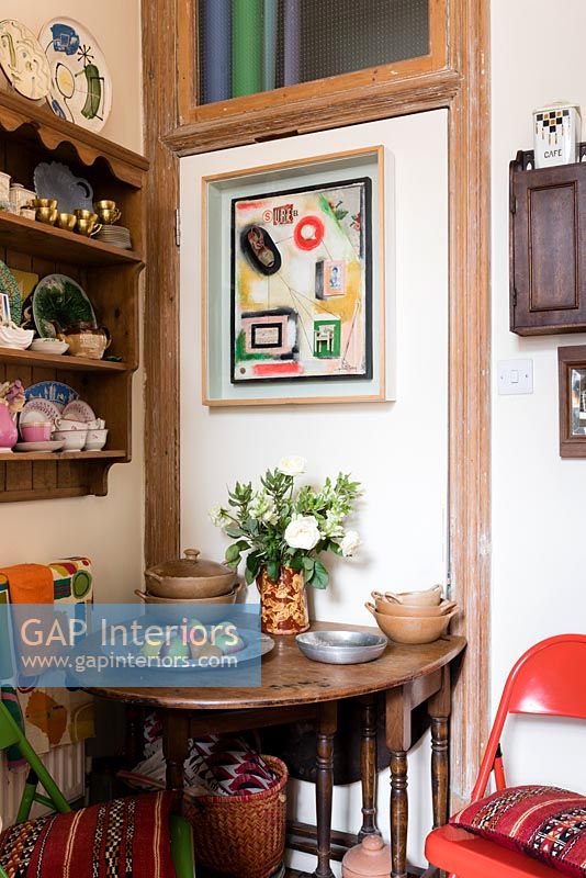 Drop leaf table in small eclectic kitchen-diner  