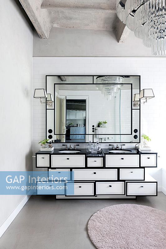 Modern bathroom with vintage sink unit and mirror 