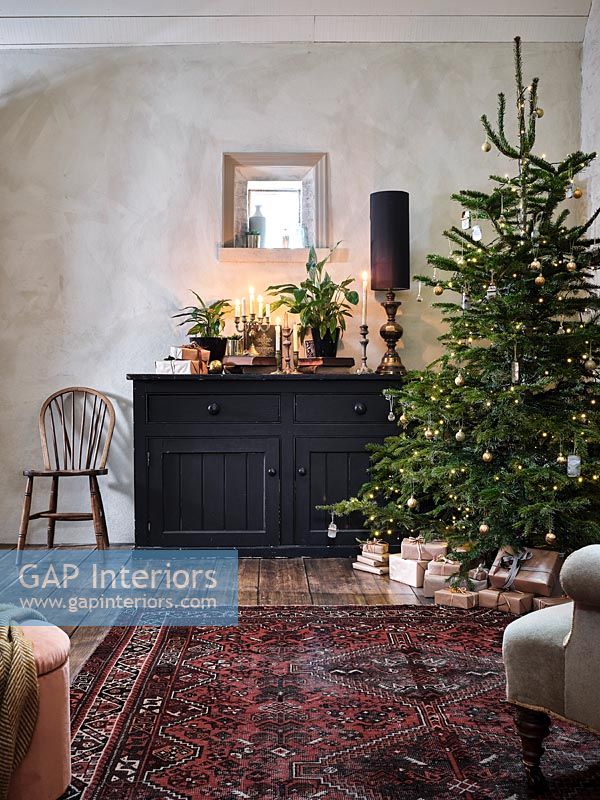 Country living room with Christmas tree 