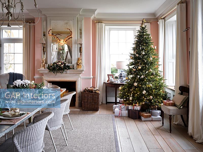 Modern country dining room laid for Christmas dinner 